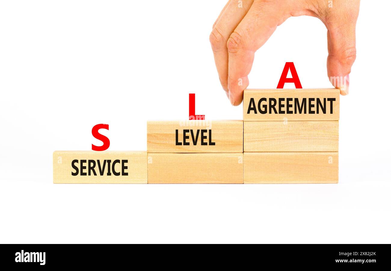 SLA service level agreement symbol. Concept words SLA service level agreement on beautiful wooden blocks. Beautiful white background. Business SLA ser Stock Photo