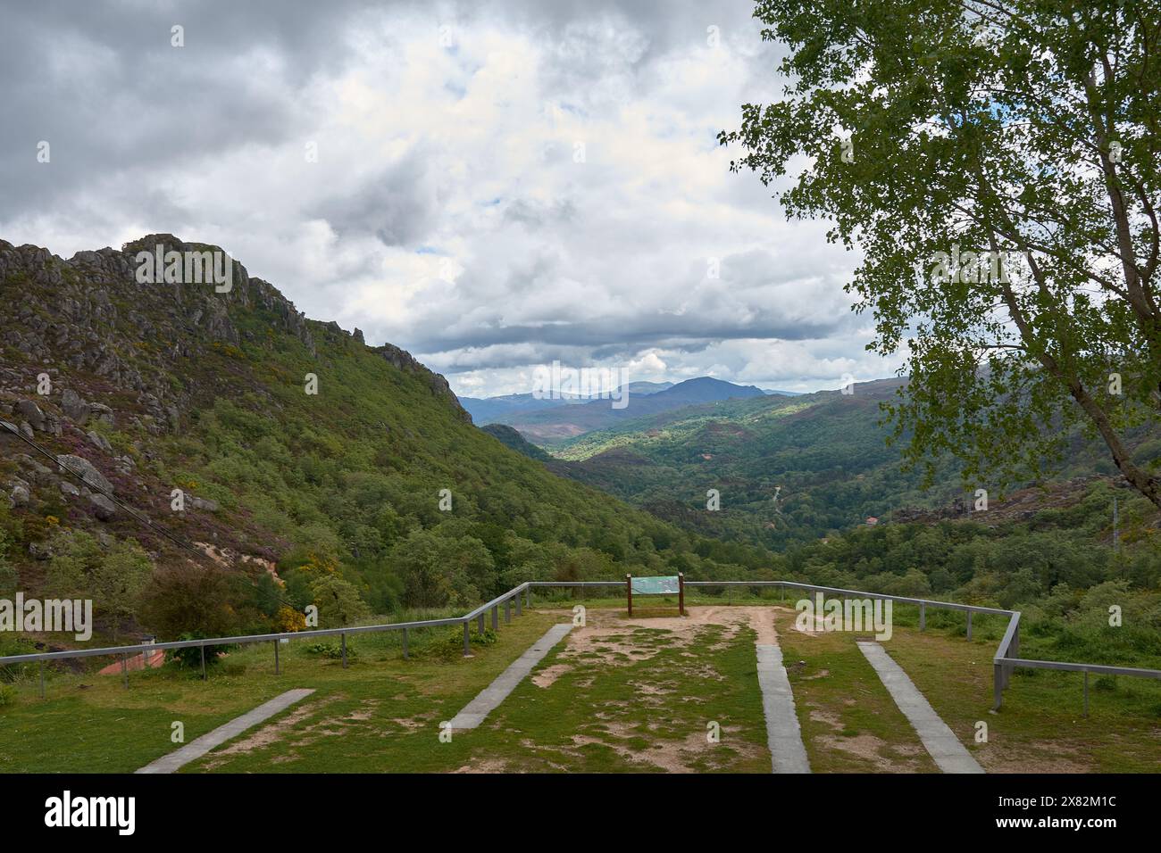 Panoramic view on a cloudy day of the landscape of Castro Lameiro located at 1033 meters above sea level, in the Peneda-Gerês National Park. Stock Photo