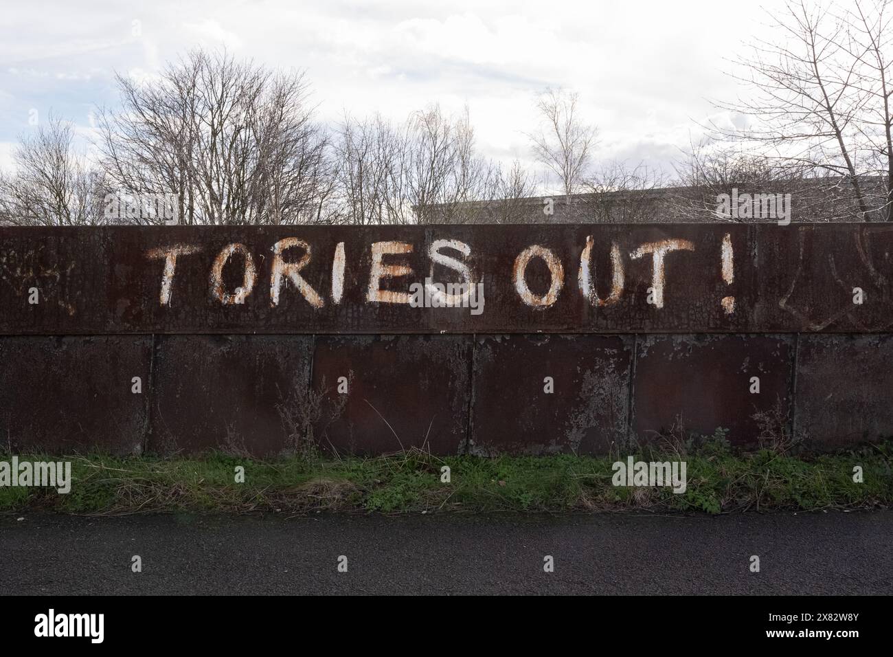 Tories Out graffiti on Orgreave railway bridge near the site of the battle of Orgreave during the 1984 miners strike, Sheffield, South Yorkshire, Stock Photo