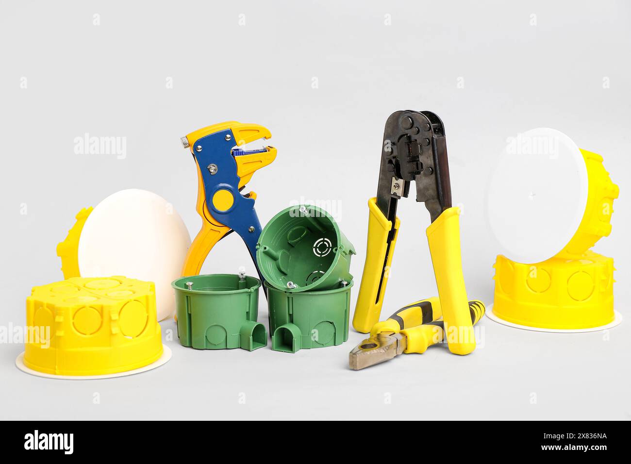 Electrician's tools on light background Stock Photo