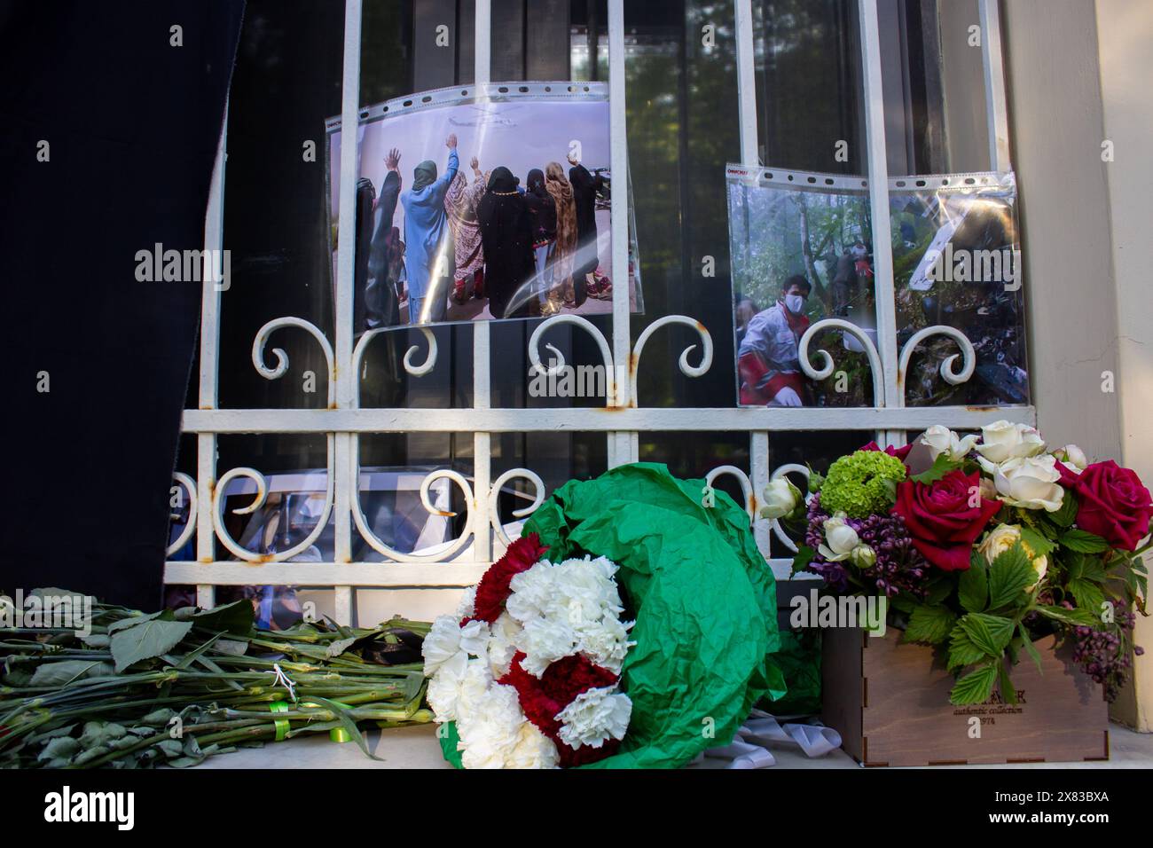 Moscow, Russia. 22nd May, 2024. Flowers and photos are seen at the Iranian Embassy in Moscow after the death of President Ebrahim Raisi. Russia and Iran expanded cooperation after the war in Ukraine began. (Credit Image: © Vlad Karkov/SOPA Images via ZUMA Press Wire) EDITORIAL USAGE ONLY! Not for Commercial USAGE! Stock Photo