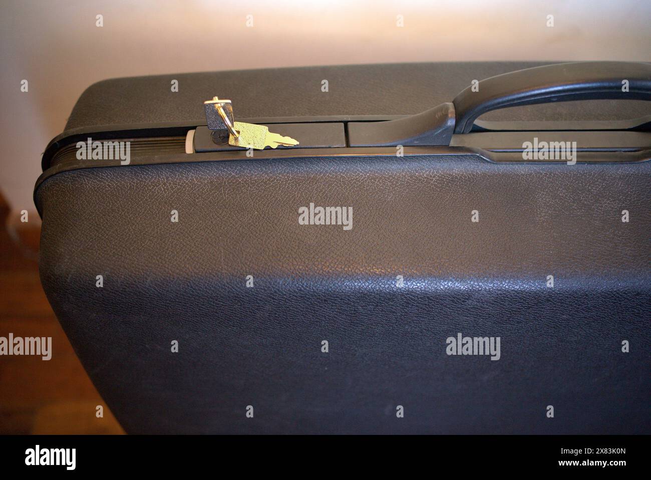 Old big suitcase with keys Stock Photo Alamy