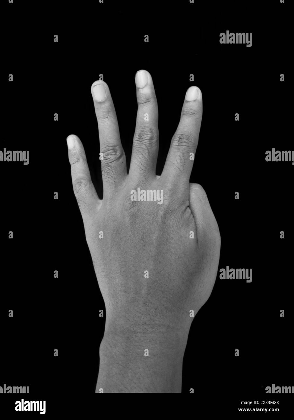 Number Four Hand Gesture. Black and White Photography Stock Photo