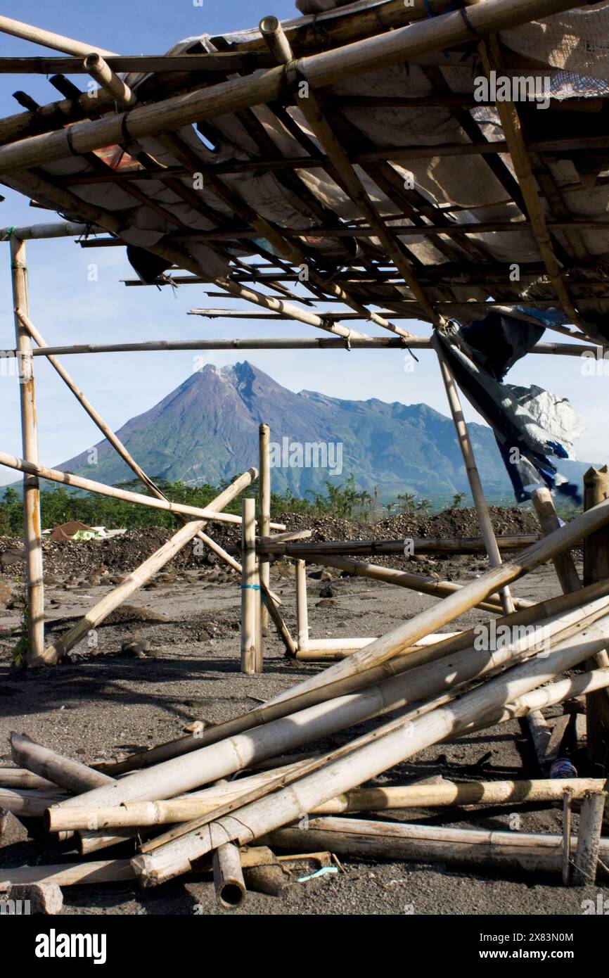 Mount Merapi, has a height of 2968 meters. The mountain famous for its lava and hot cloud avalanches, has the character of a stratovolcano eruption. Stock Photo