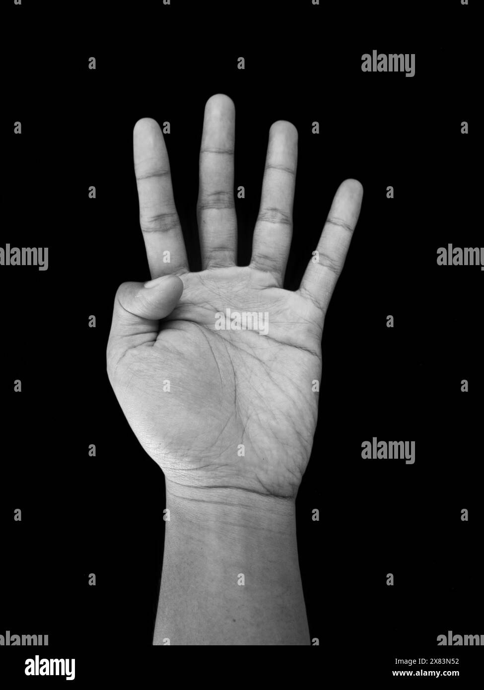 Number Four Hand Sign, Isolated on Black Background Stock Photo