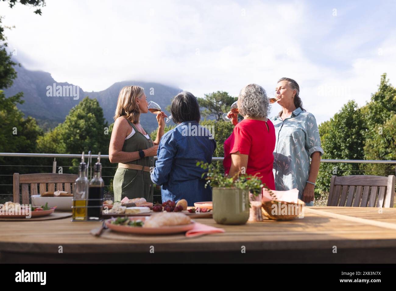 Diverse female friends talking one hi-res stock photography and images ...