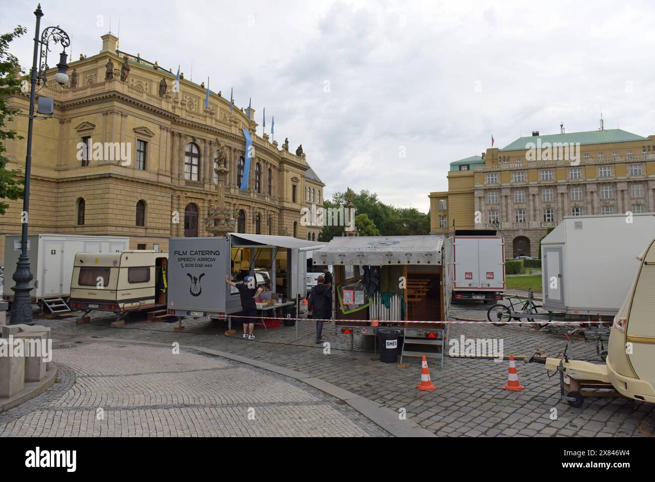 A film unit crew on location outside Museum of Decorative Arts in Prague, Uměleckoprůmyslové museum v Praze,Jan Palach Square, Praha, May 2024 Stock Photo