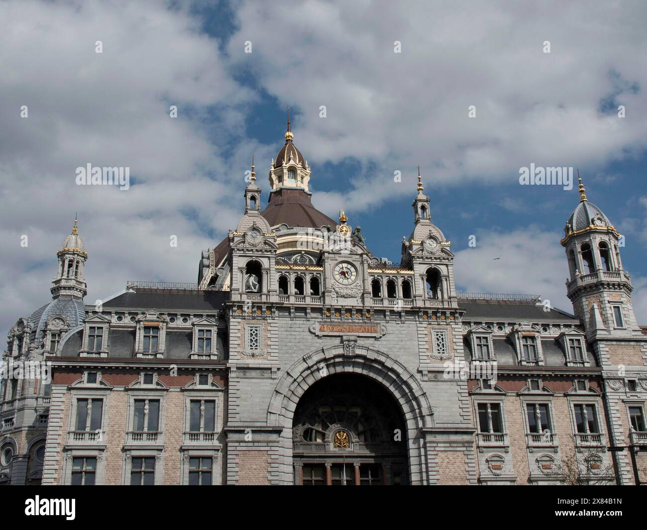 Historic facade of a magnificent building with domes and towers under a ...