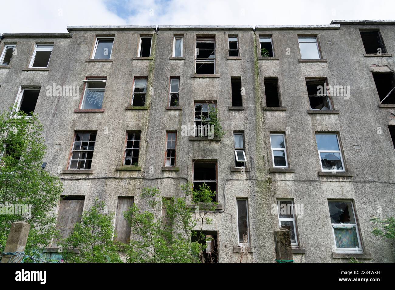 View of derelict abandoned apartment buildings at Clune Park in Port Glasgow, Inverclyde, Scotland, UK Stock Photo