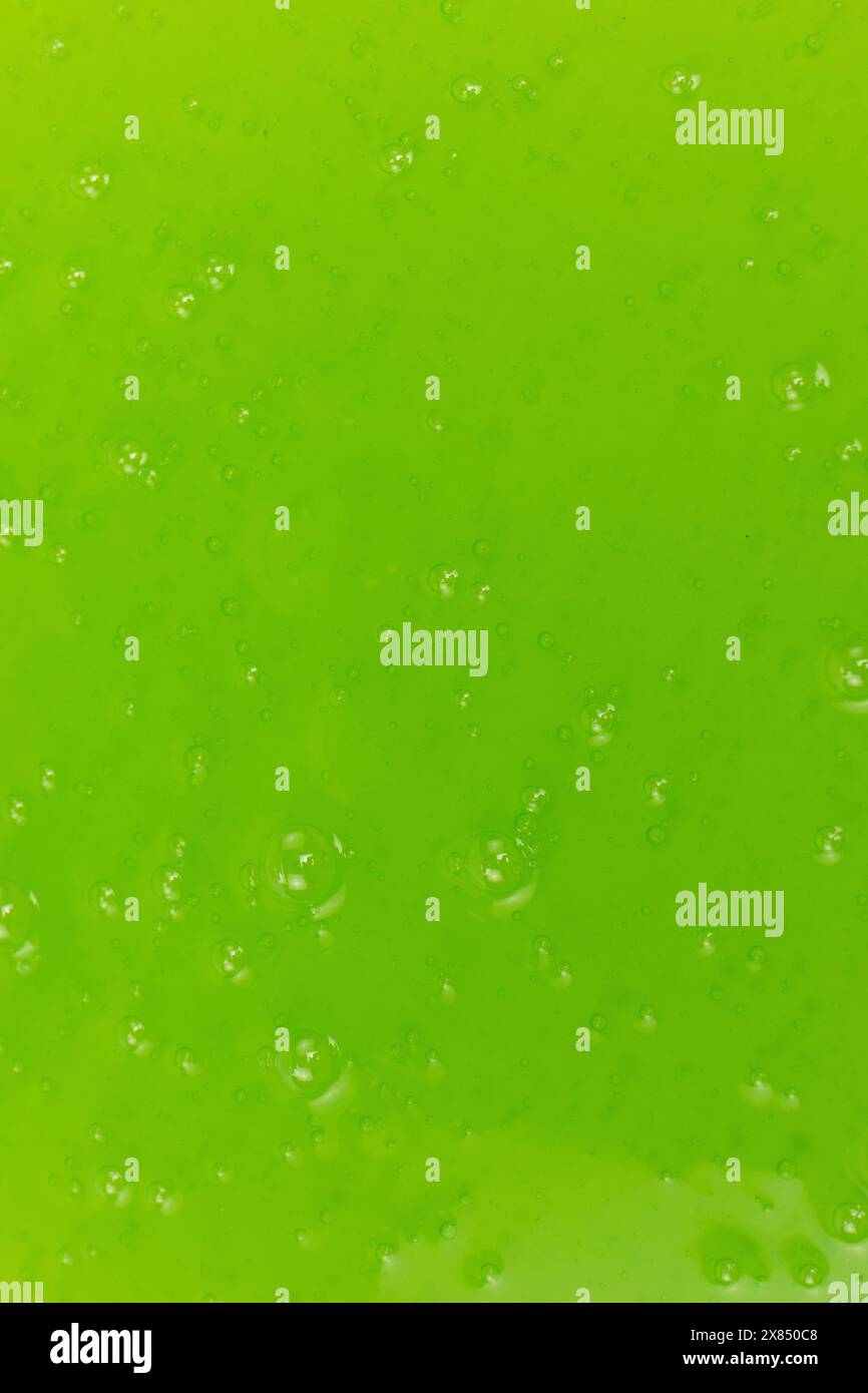 Green slime toy as a background. Top view Stock Photo - Alamy