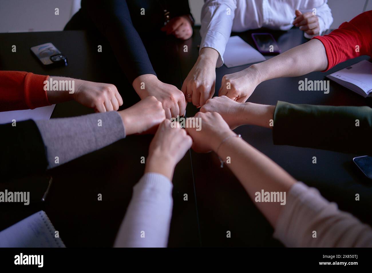the team members in the office congratulate each other on a good job ...