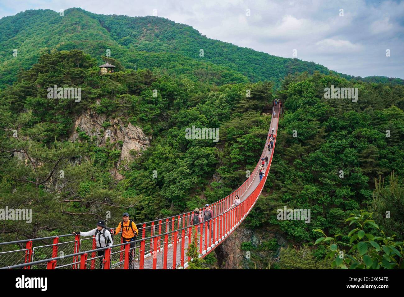 Paju, South Korea. 18th May, 2024. Hikers walk on the Gamaksan