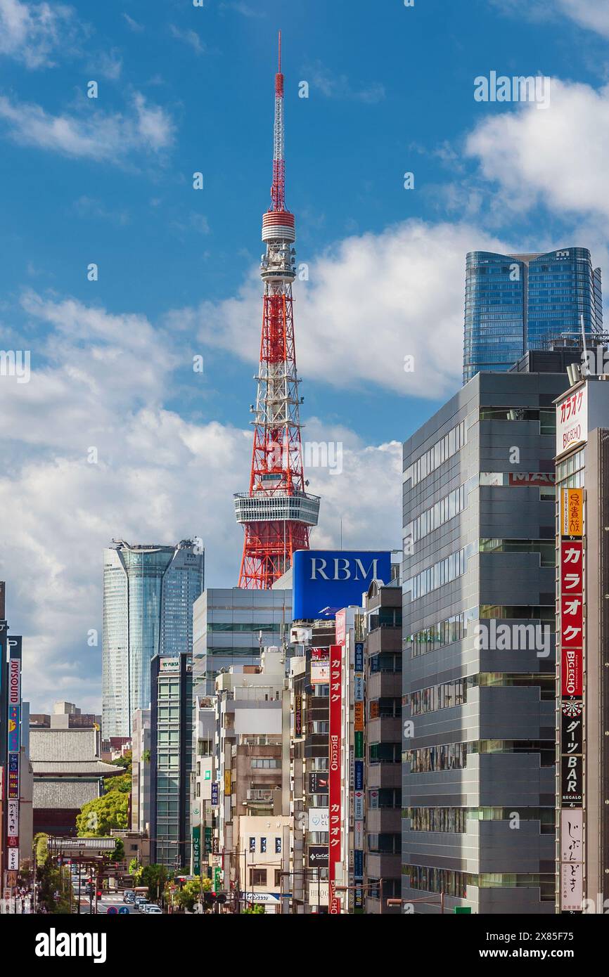Tokyo modern landmarks. Roppongi Hills, Azabudai Hills skyscrapers and the famous Tokyo Tower in Minato Ward Stock Photo