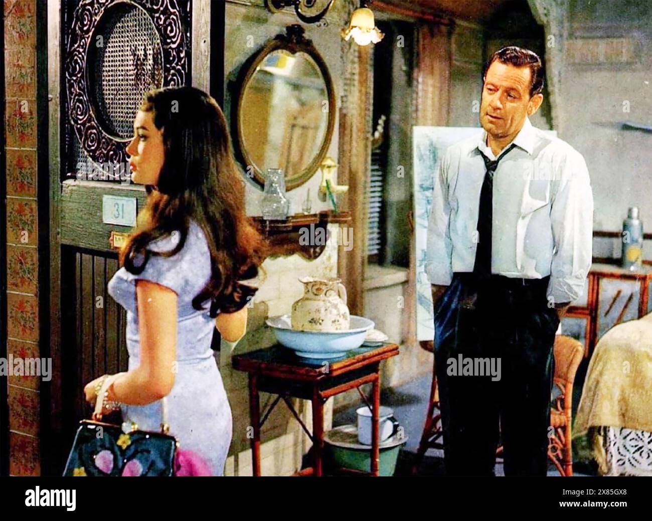 THE WORLD OF SUZIE WONG  1960 Paramount Pictures film with Nancy Kwan as Suzie Wong and William Holden as Robert Lomax Stock Photo