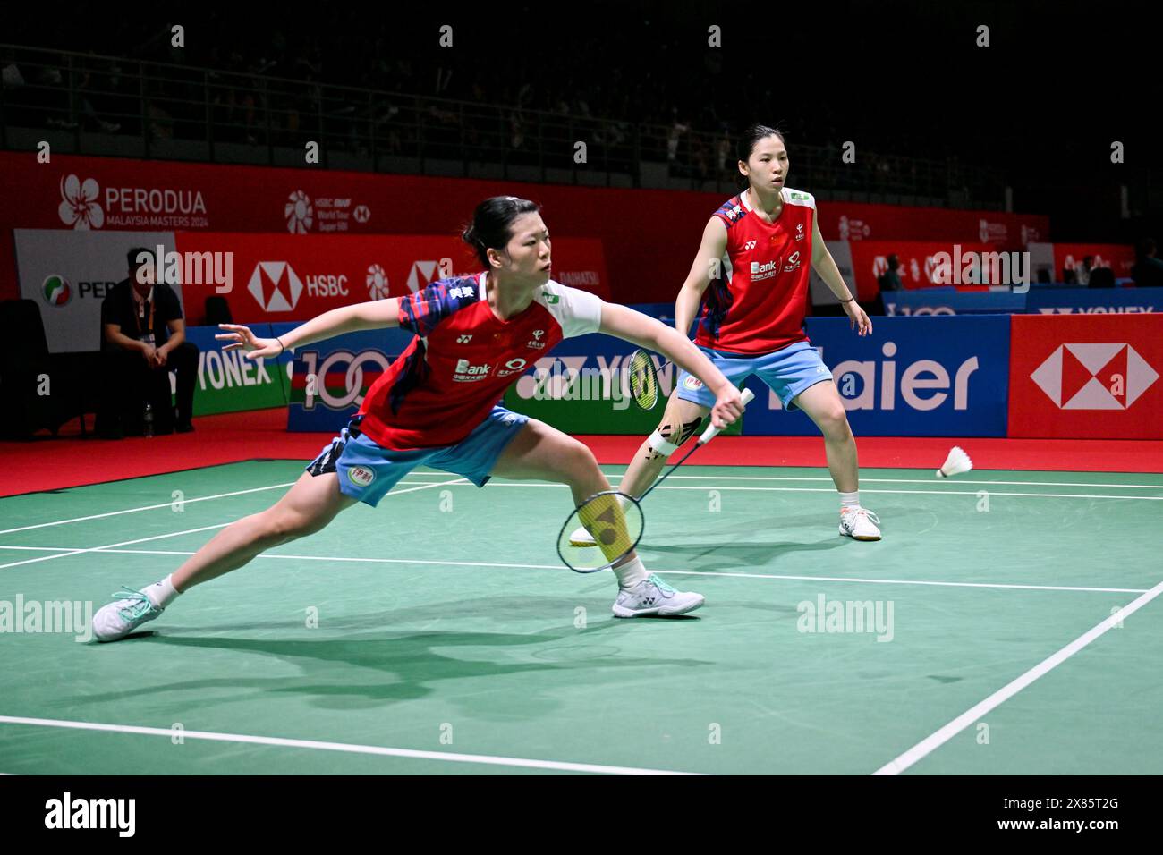 Kuala Lumpur, Malaysia. 23rd May, 2024. Li Yijing/Luo Xumin (L) of China compete against Chang Ching Hui/Yang Ching Tun of Chinese Taipei during their women's doubles round of 16 match at Malaysia Masters 2024 in Kuala Lumpur, Malaysia, May 23, 2024. Credit: Cheng Yiheng/Xinhua/Alamy Live News Stock Photo