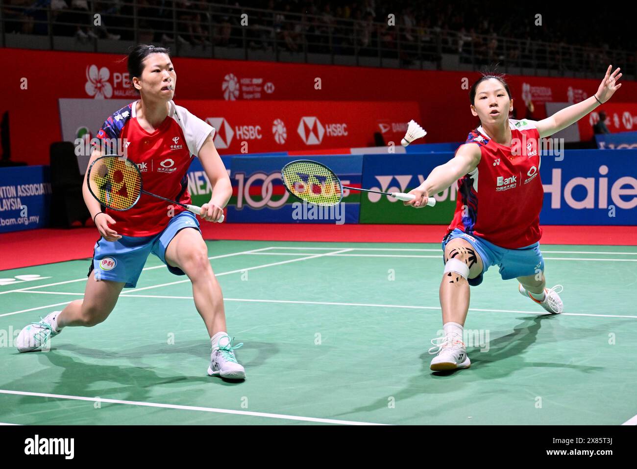 Kuala Lumpur, Malaysia. 23rd May, 2024. Li Yijing (R)/Luo Xumin of China compete against Chang Ching Hui/Yang Ching Tun of Chinese Taipei during their women's doubles round of 16 match at Malaysia Masters 2024 in Kuala Lumpur, Malaysia, May 23, 2024. Credit: Cheng Yiheng/Xinhua/Alamy Live News Stock Photo