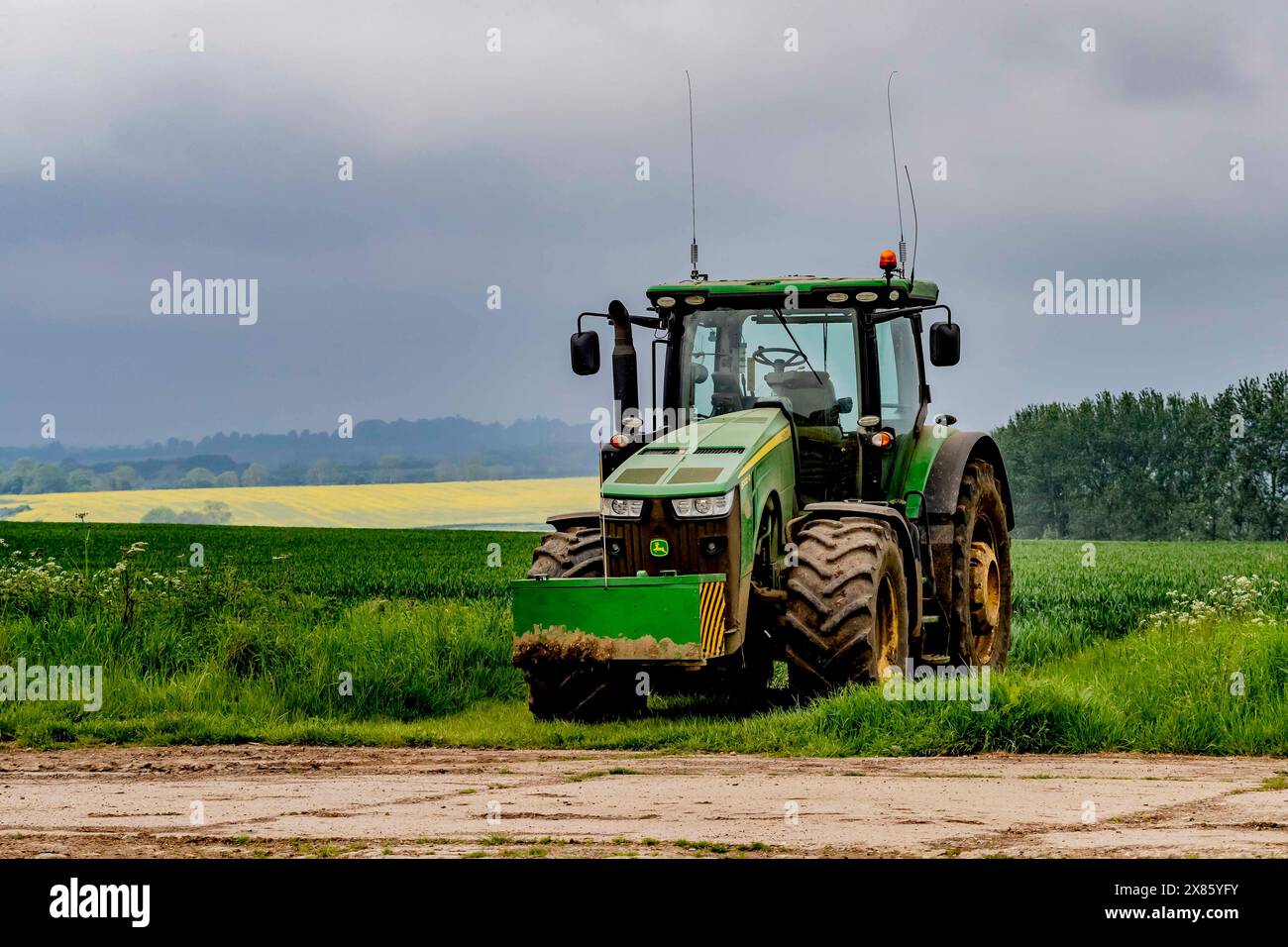 John Deere 8320R front view parked on farmland off Loverose way ...