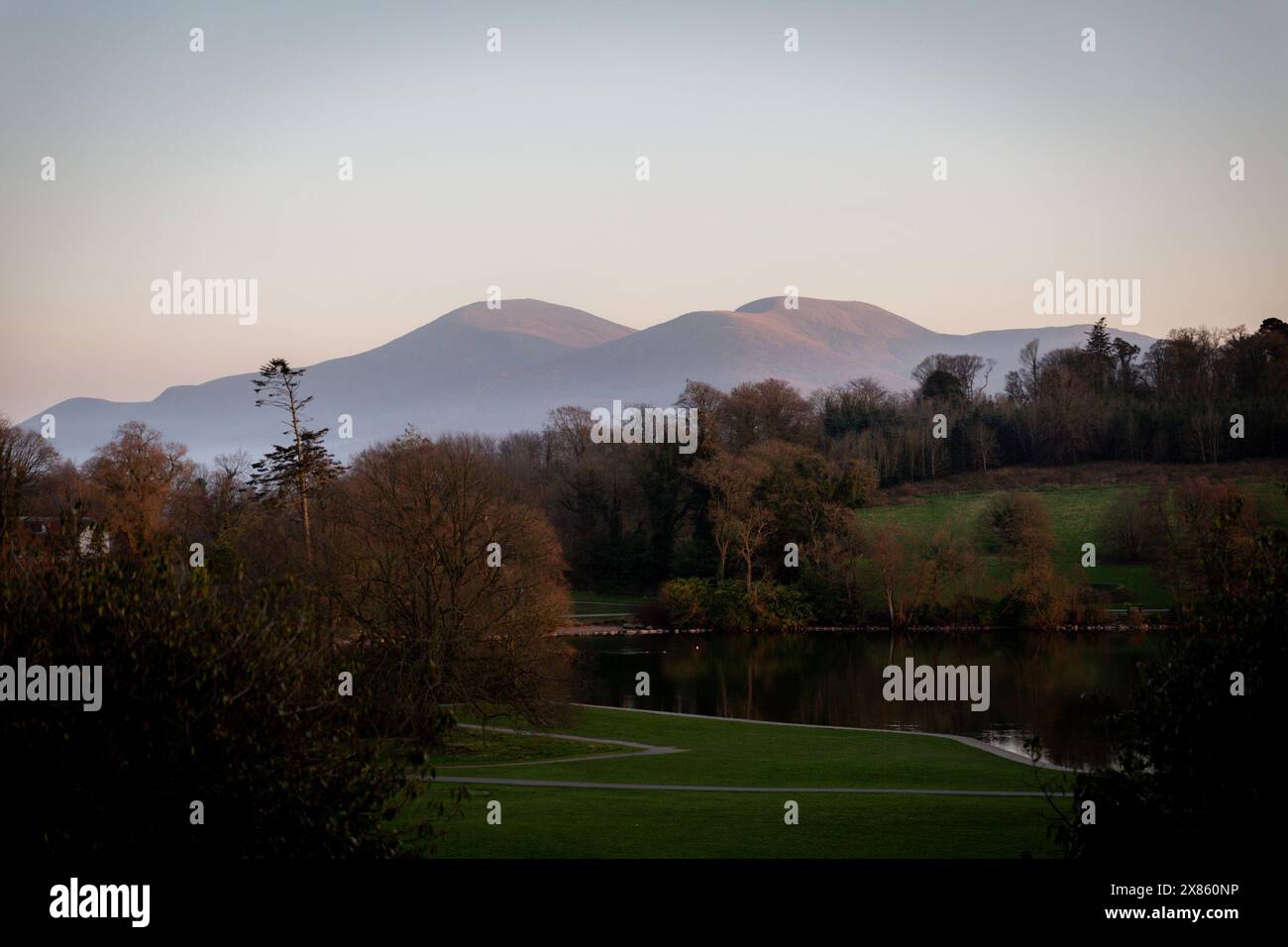 Sunset Photo of the Mourne Mountains taken from Castlewellan Forest Park Stock Photo