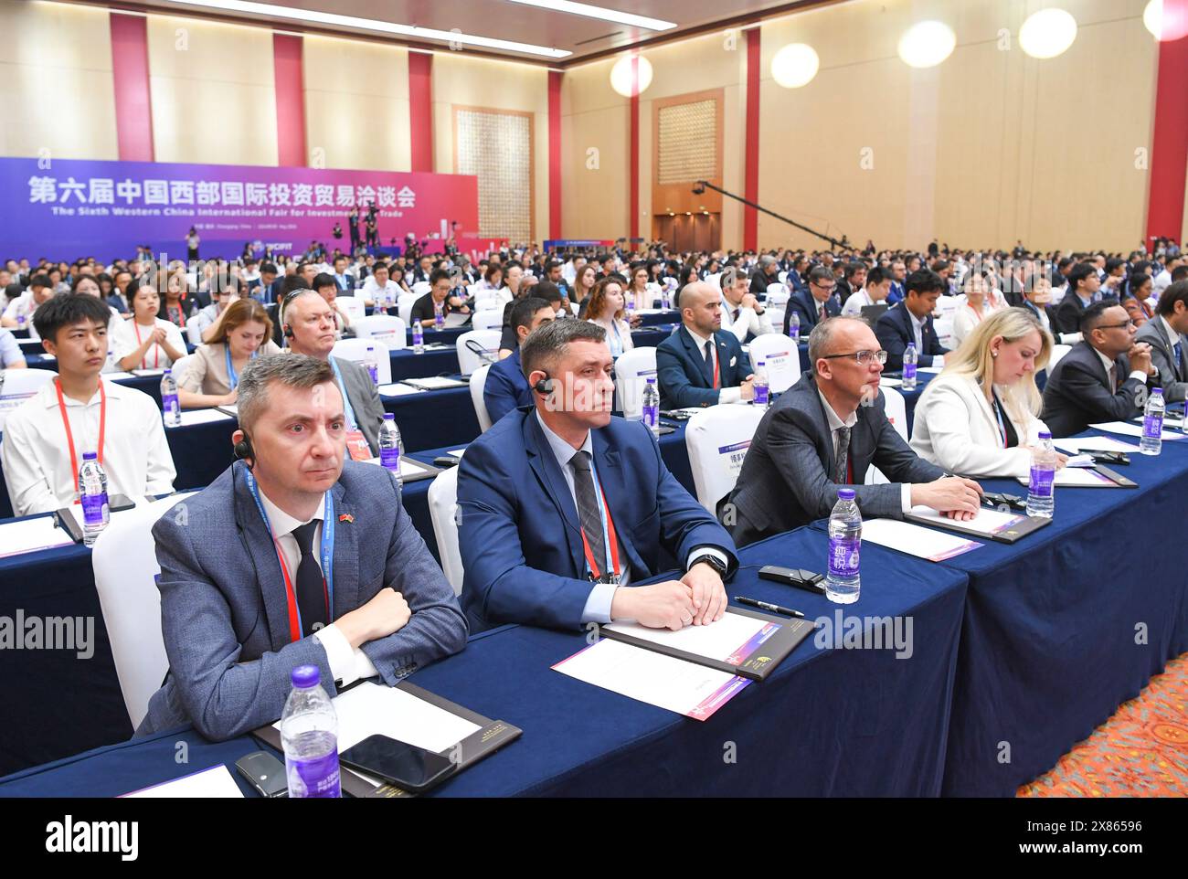 Chongqing. 23rd May, 2024. People attend the opening ceremony of the Sixth Western China International Fair for Investment and Trade in southwest China's Chongqing Municipality, May 23, 2024. With the theme of 'New Western China, New Manufacturing, New Services', the fair is held from May 23 to 26 in Chongqing. Credit: Wang Quanchao/Xinhua/Alamy Live News Stock Photo