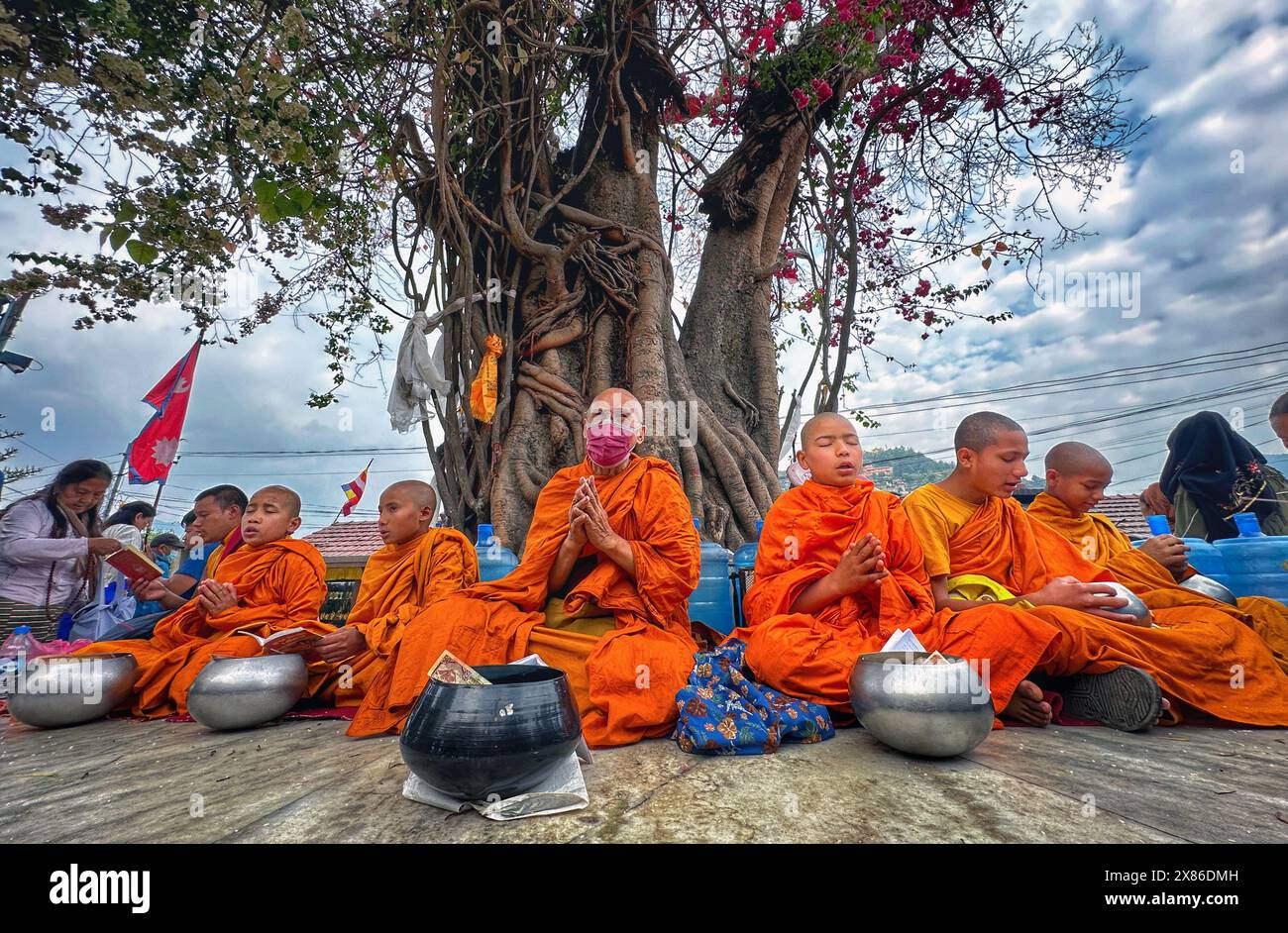 May 23, 2024: Buddhist monks offer prayers in the celebration of Buddha Jayanti Festival, the birth anniversary of Buddha, also known as Vesak Day at Swayambhu, a UNESCO heritage site in Kathmandu, capital of Nepal, on May 23, 2024. The Buddha Jayanti festival is celebrated as a holy day by Buddhists in many Asian countries to mark the birth, enlightenment and Nirvana of Gautam Buddha. (Credit Image: © Sunil Sharma/ZUMA Press Wire) EDITORIAL USAGE ONLY! Not for Commercial USAGE! Stock Photo
