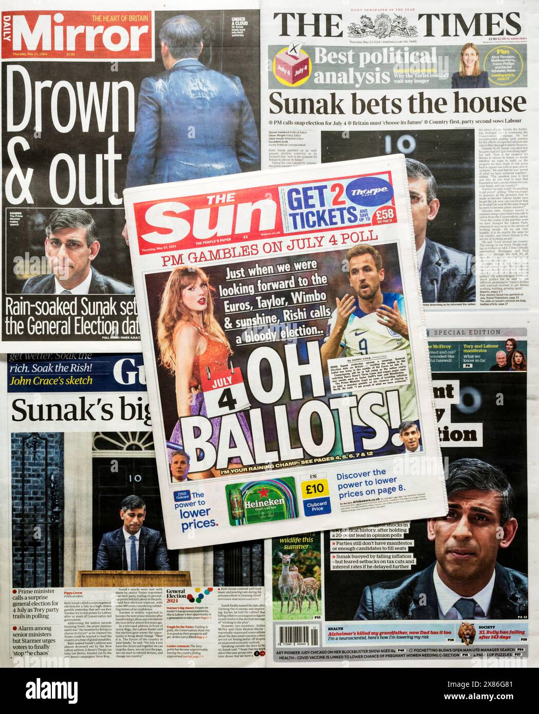 23 May 2024.  A selection of newspapers show Rishi Sunak standing in the rain to announce the date of the General Election; it is to be held on 4 July 2024. Stock Photo