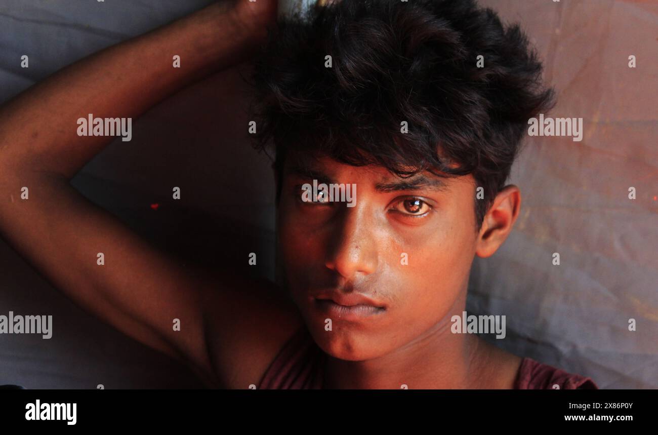 Medan Selayangh, North Sumatra, Indonesia. 23rd May, 2024. One of the Rohingya ethnic boys from Mnyamar is in a makeshift tent, in the coastal area of ''‹''‹Tanjung Pura Indonesia, Kwala Langkat village, North Sumatra, 23 May 2024 (Credit Image: © Kartik Byma/ZUMA Press Wire) EDITORIAL USAGE ONLY! Not for Commercial USAGE! Stock Photo