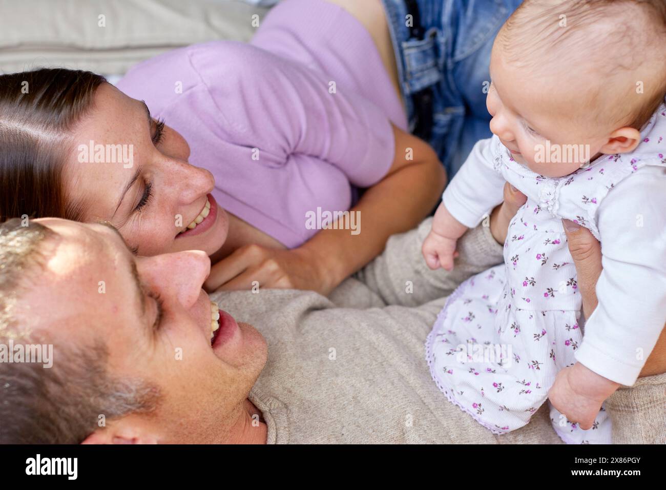 Father holding newborn baby Stock Photo