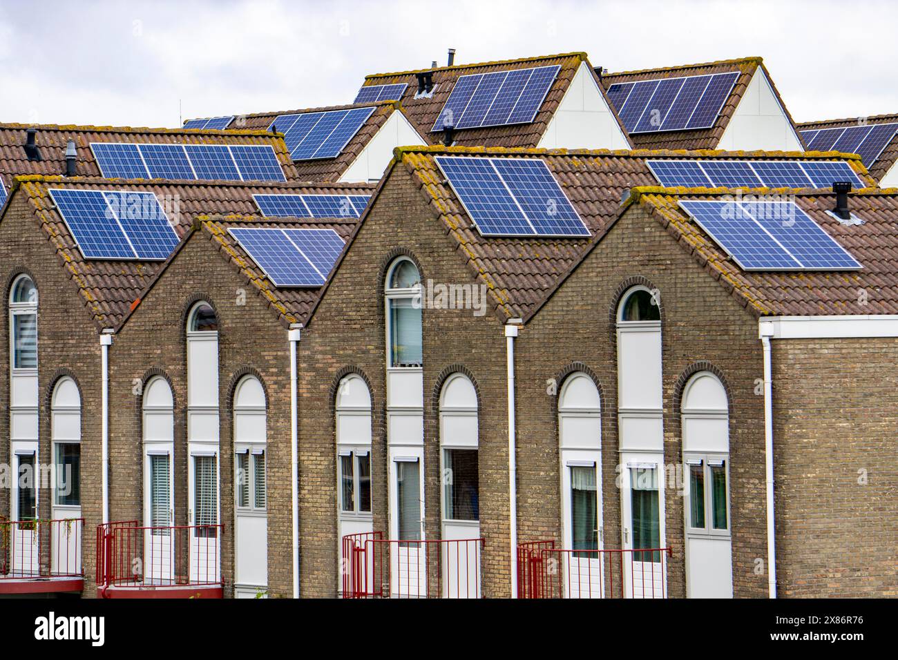 Solar modules on roofs, on pitched roofs of residential buildings, Vlissingen, Netherlands, Stock Photo