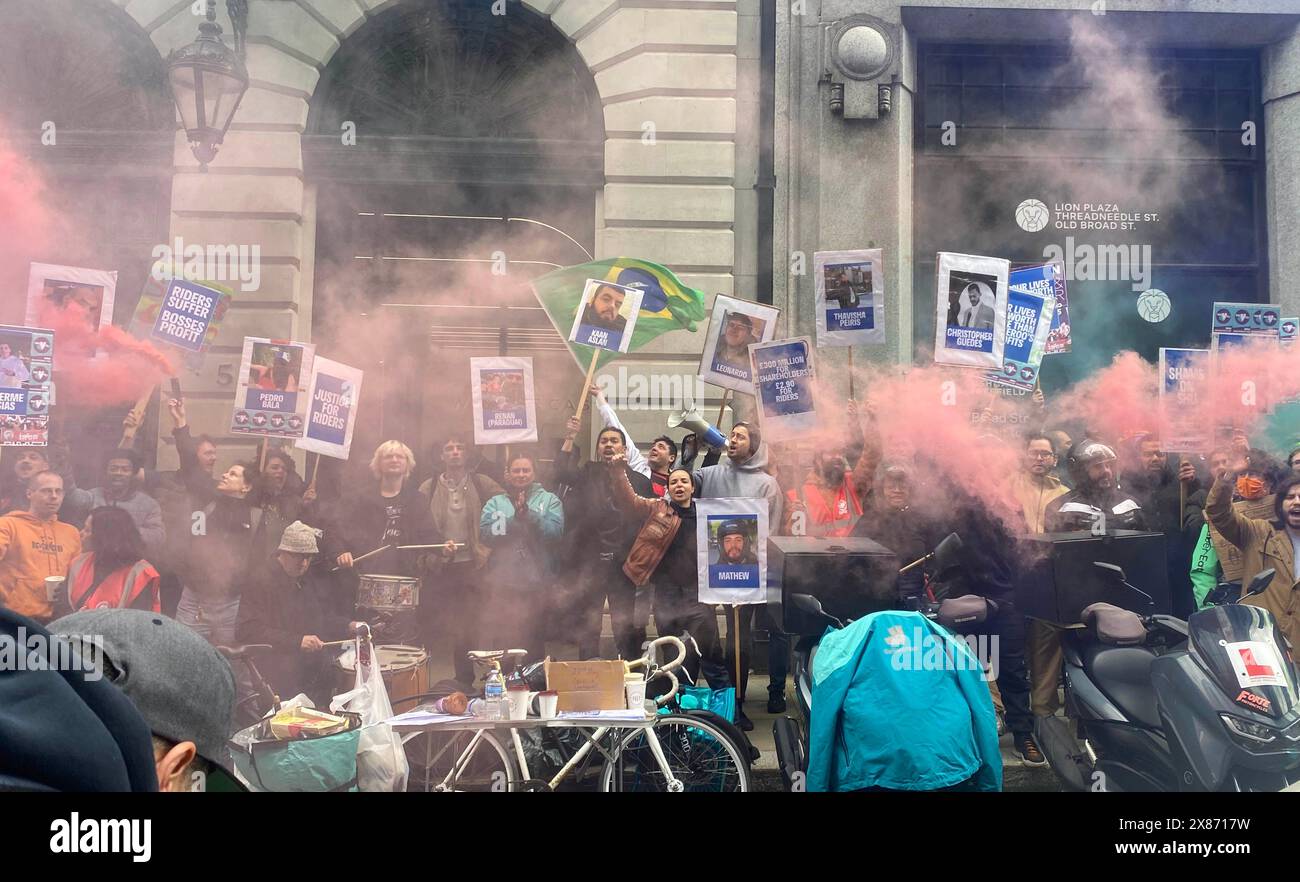 Deliveroo drivers during a demonstration outside the offices of White ...