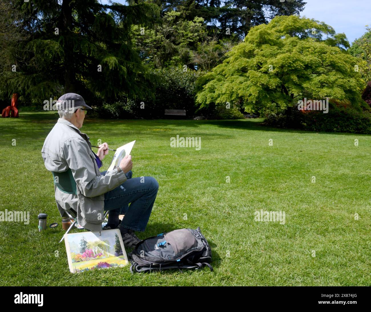 Vancouver, British Columbia, USA. 22nd May, 2024. A man paints landscapes in the VanDusen Botanical Garden in Vancouver, British Columbia, Wednesday, May 22, 2022. The grounds were a golf course before it became the botanical garden. (Credit Image: © Mark Hertzberg/ZUMA Press Wire) EDITORIAL USAGE ONLY! Not for Commercial USAGE! Stock Photo