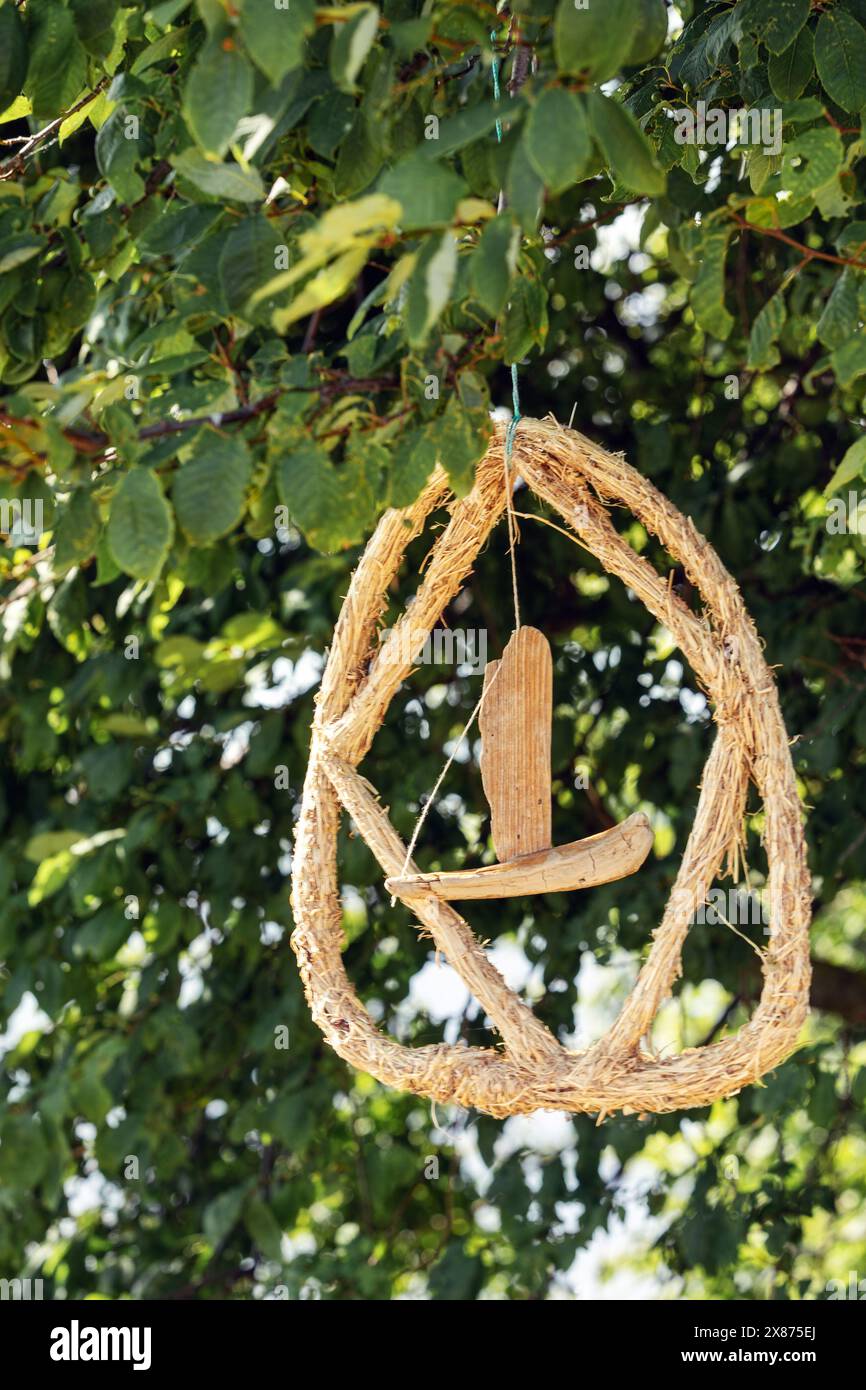 The dreamcatcher of the fishermen of the Curonian Lagoon on a tree branch. Lithuania, Horn of Vente. Stock Photo