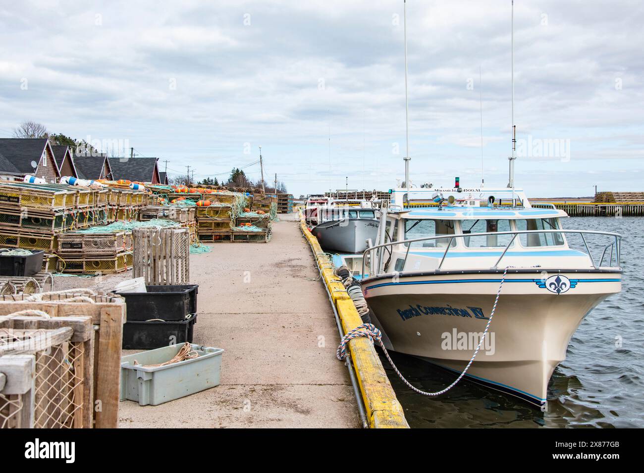 Boats tied up at the dock in North Rustico, Prince Edward Island, Canada Stock Photo