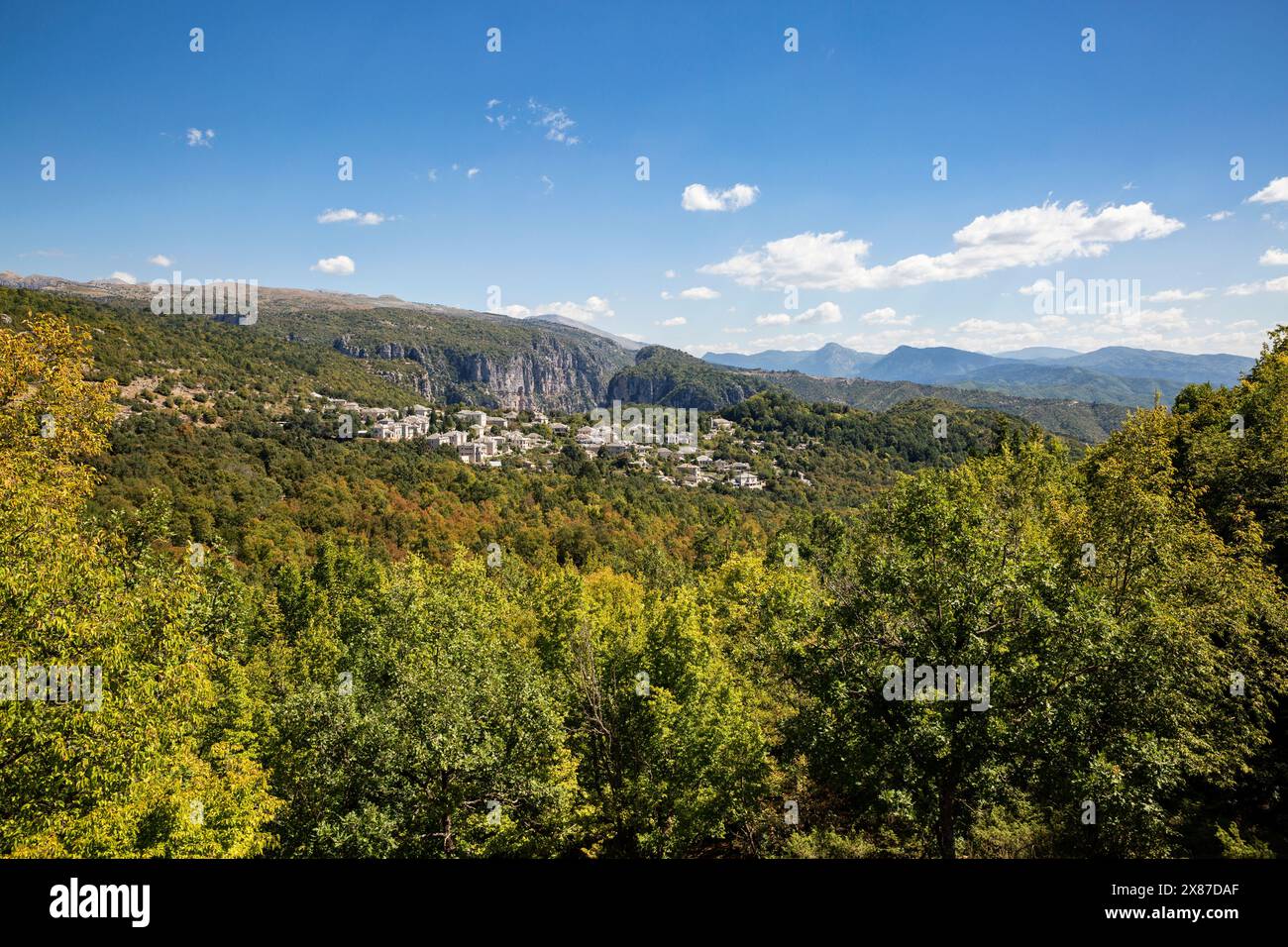 Greece, Epirus, Zagori, Forest surrounding village in Vikos-Aoos National Park during summer Stock Photo