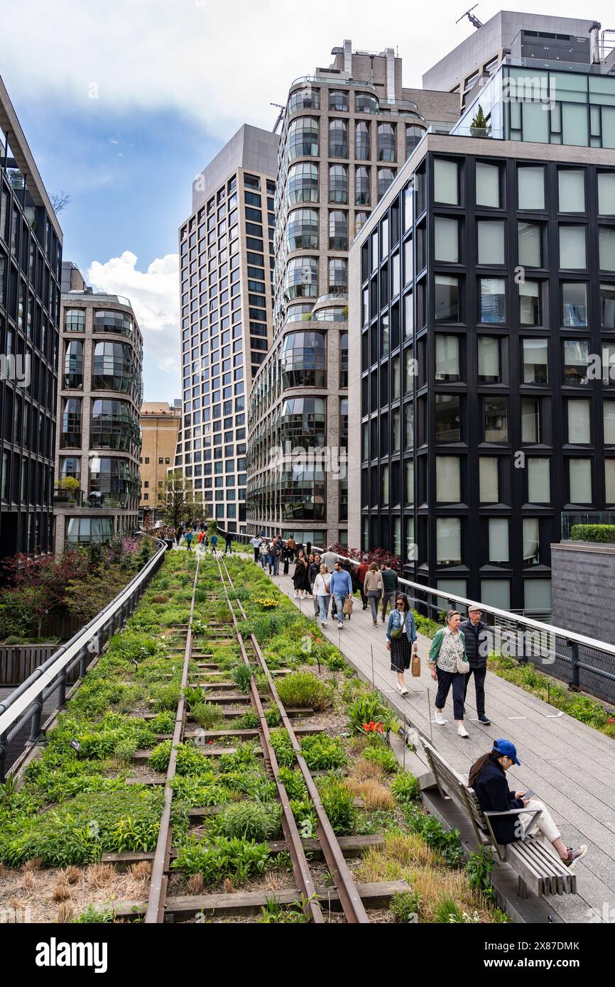 people enjoy the High Line park in Manhattan in New York City, NY, USA ...