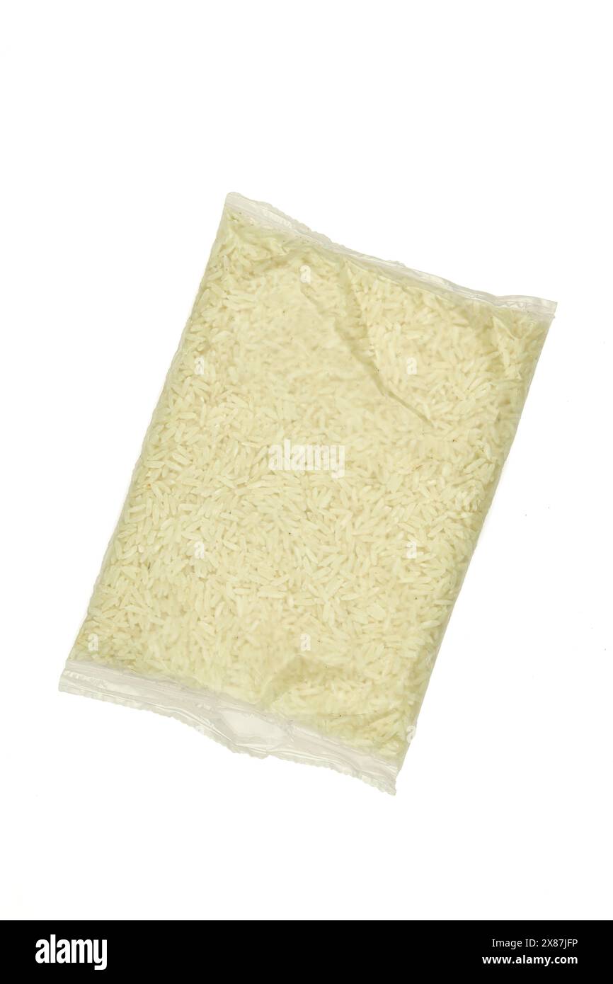 Small bag full of rice isolated on white background Stock Photo - Alamy