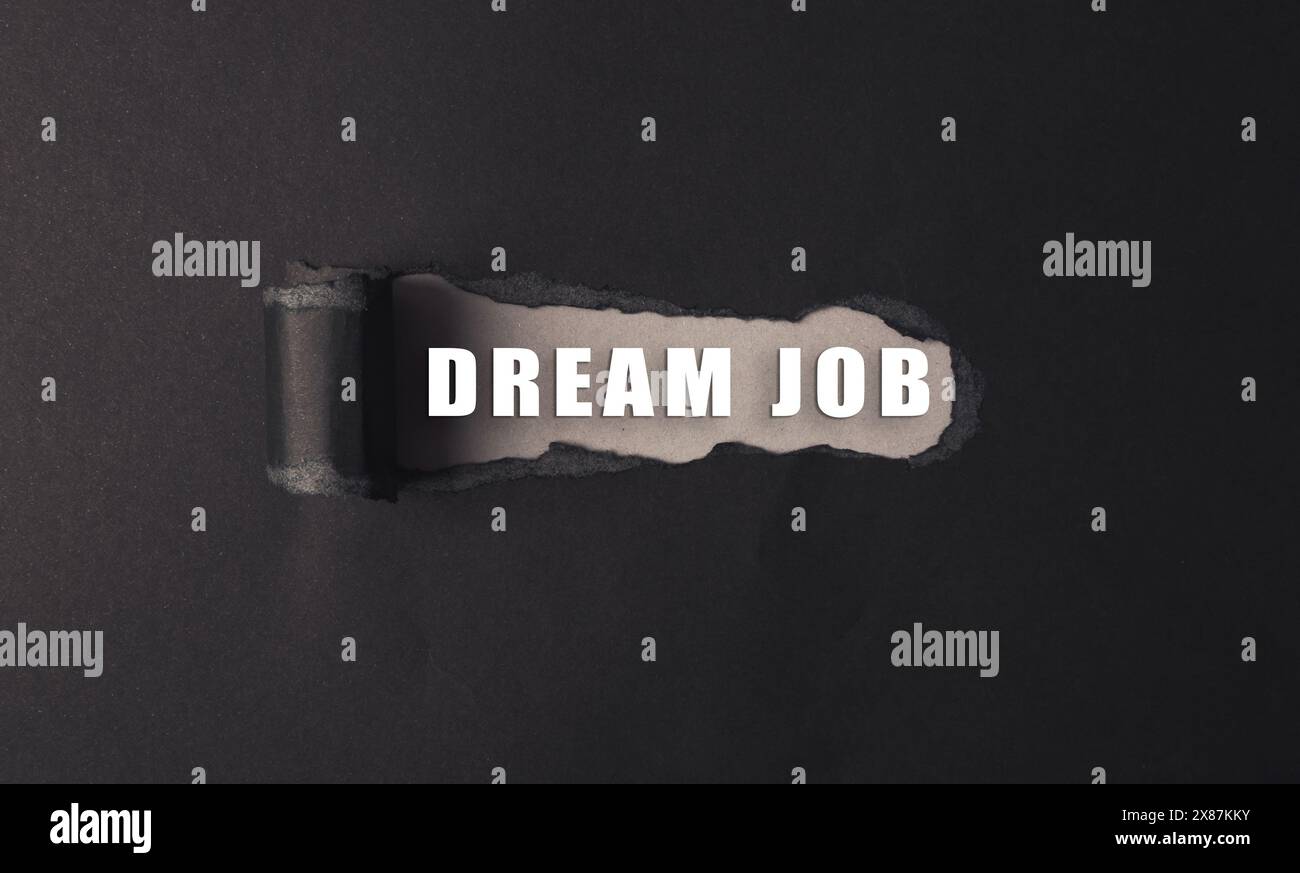 A black and white image of a paper with the words dream job written on it Stock Photo