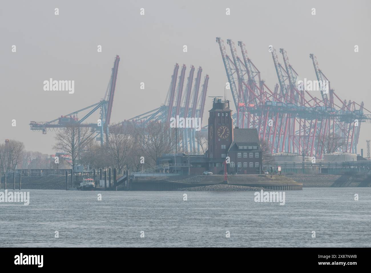 Germany, Hamburg, Lotsenhaus Seemannshoft with Port of Hamburg in background Stock Photo