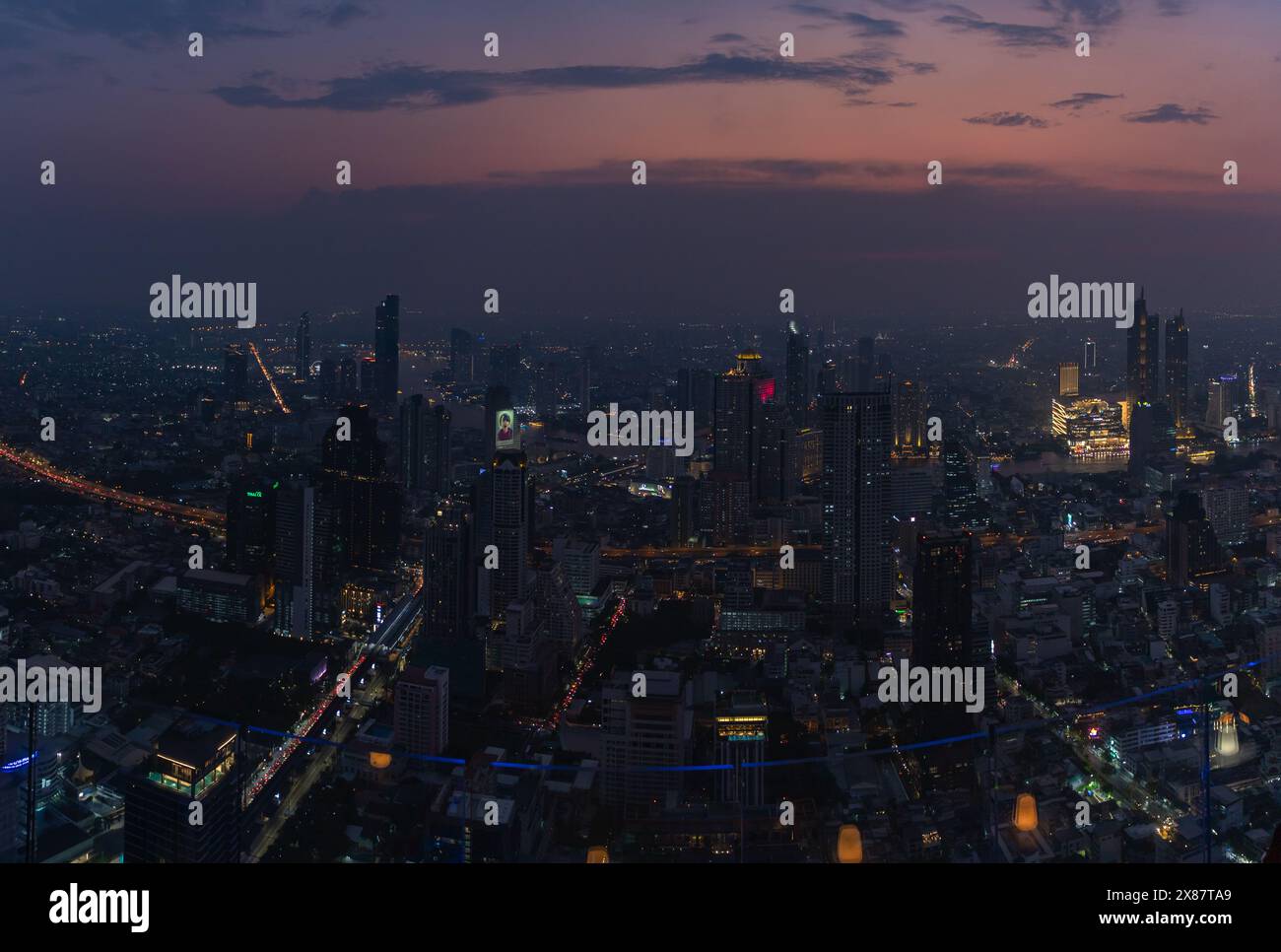 A picture of the buildings of South Bangkok at night Stock Photo - Alamy