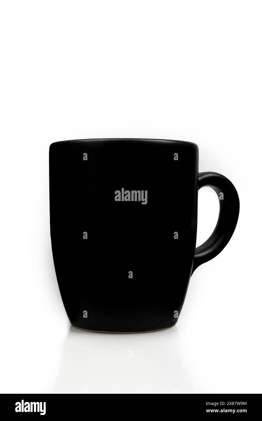 Regular black ceramic cup with handle isolated on white background. Blank mug Stock Photo