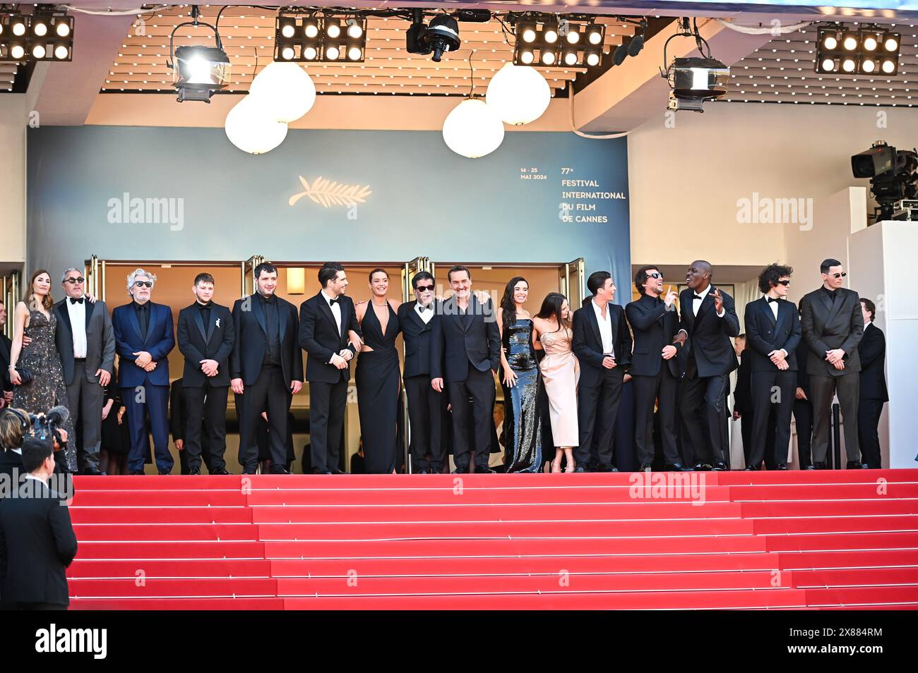 The President of the Jury International Critics' Week, Audrey Diwan, along with Ahmed Hamidi, Alain Chabat, Anthony Bajon, Karim Laklou, Francois Civil, Adele Exarchopoulos, Alain Attal, Gilles Lellouche, Elodie Bouchez, Mallory Wanecque, Malik Frikah, Producer Hugo Selignac, Jean-Pascal Zadi, Vincent Lacoste, and Raphael Quenard, are attending the ''L'Amour Ouf'' (Beating Hearts) Red Carpet at the 77th annual Cannes Film Festival at Palais des Festivals in Cannes, France, on May 23, 2024. (Photo by Stefanos Kyriazis/NurPhoto) Stock Photo