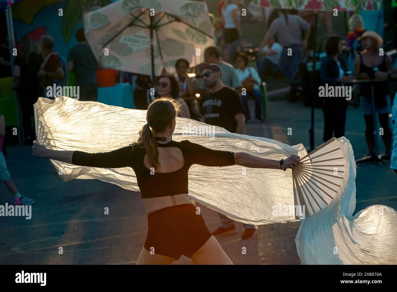 Scarf dancer entertaining the crowd at the Beakerhead Festival, Calgary Alberta Canada Stock Photo