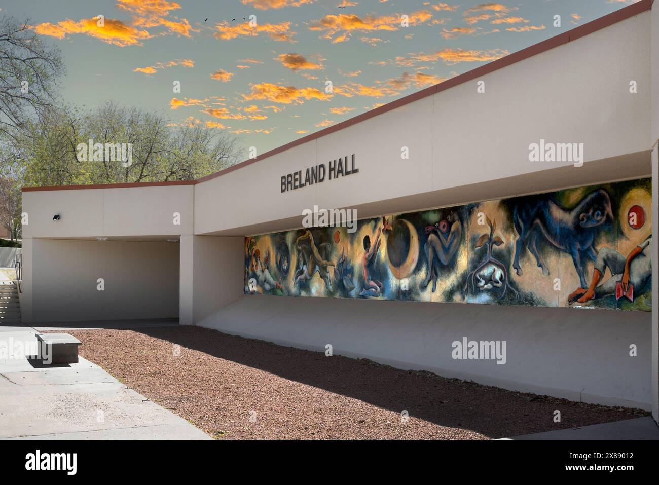 A colorful mural on the exterior wall of Breland Hall on the campus at the New Mexico State Unitversity, Las Cruces, NM, USA Stock Photo