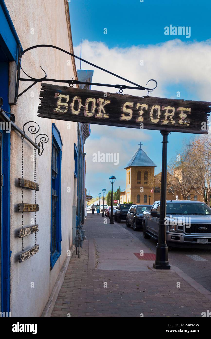 The Bowlin's Mesilla Book Center's hanging sign on the Plaza is a landmark business in vintage Mesilla, NM, USA Stock Photo