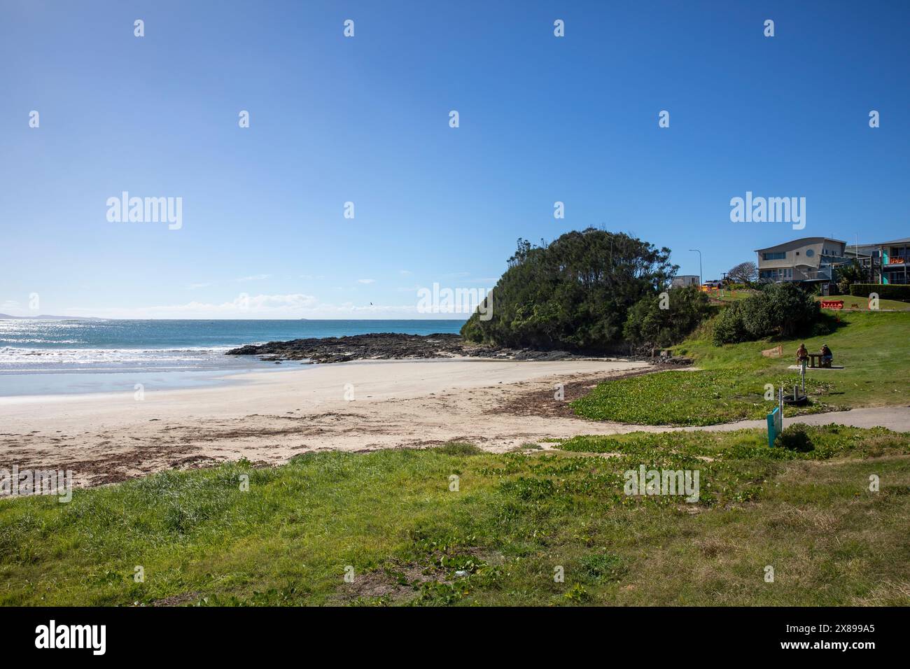 Woolgoolga beach on the Coffs Harbour coast, seaside beach on blue sky autumn day, east coast of New South Wales,Australia Stock Photo