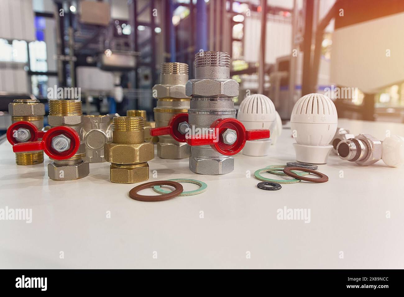 Valves, fittings, thermostats, rubber seals on the stand, plumbing