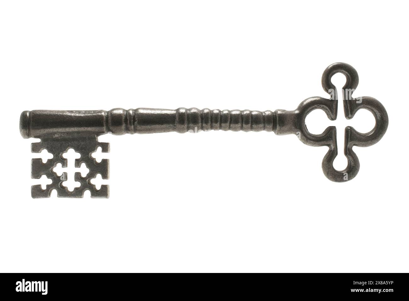 Old door key on white background Stock Photo