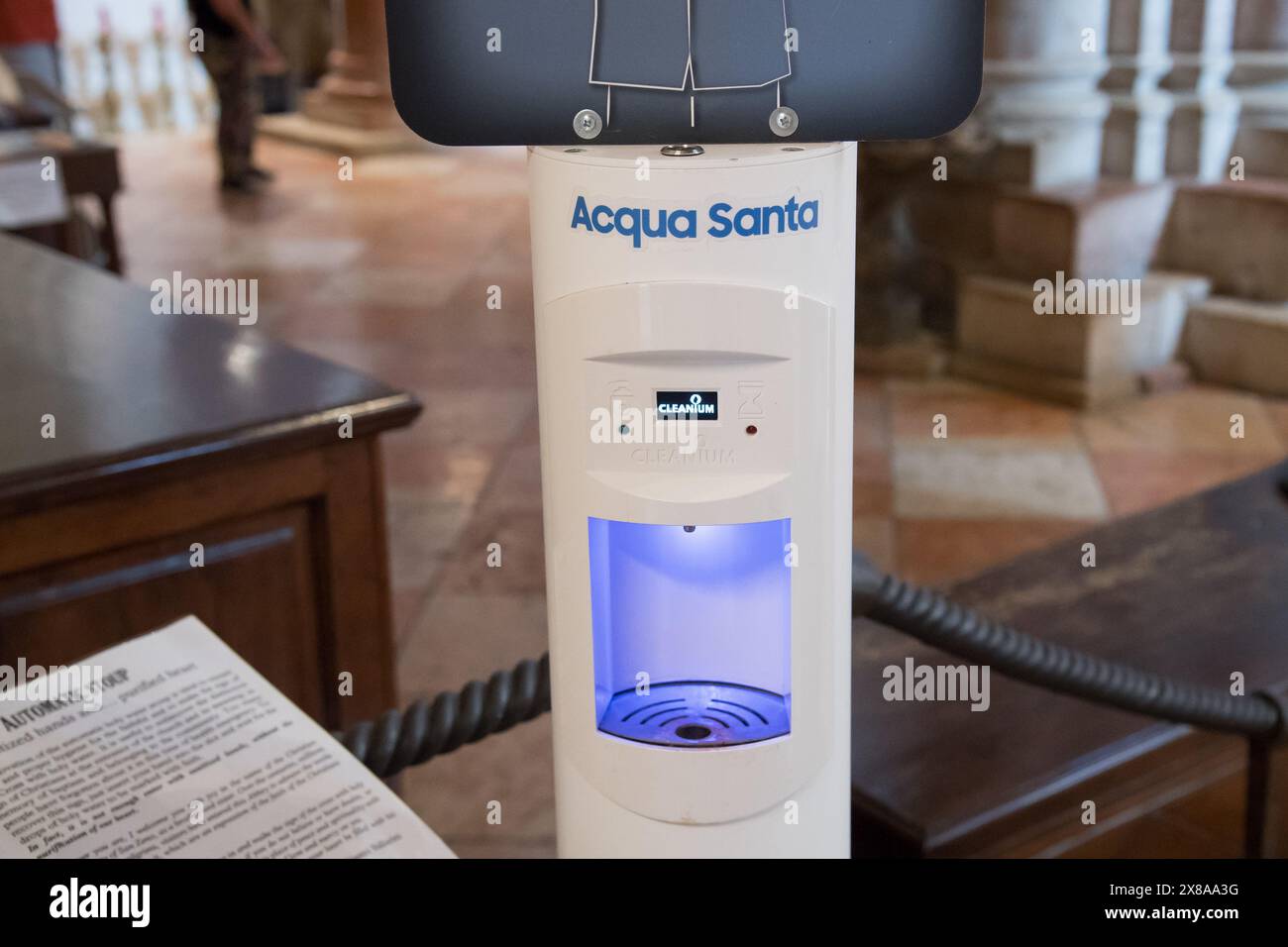 Automatic touchless holy water dispenser hires stock photography and