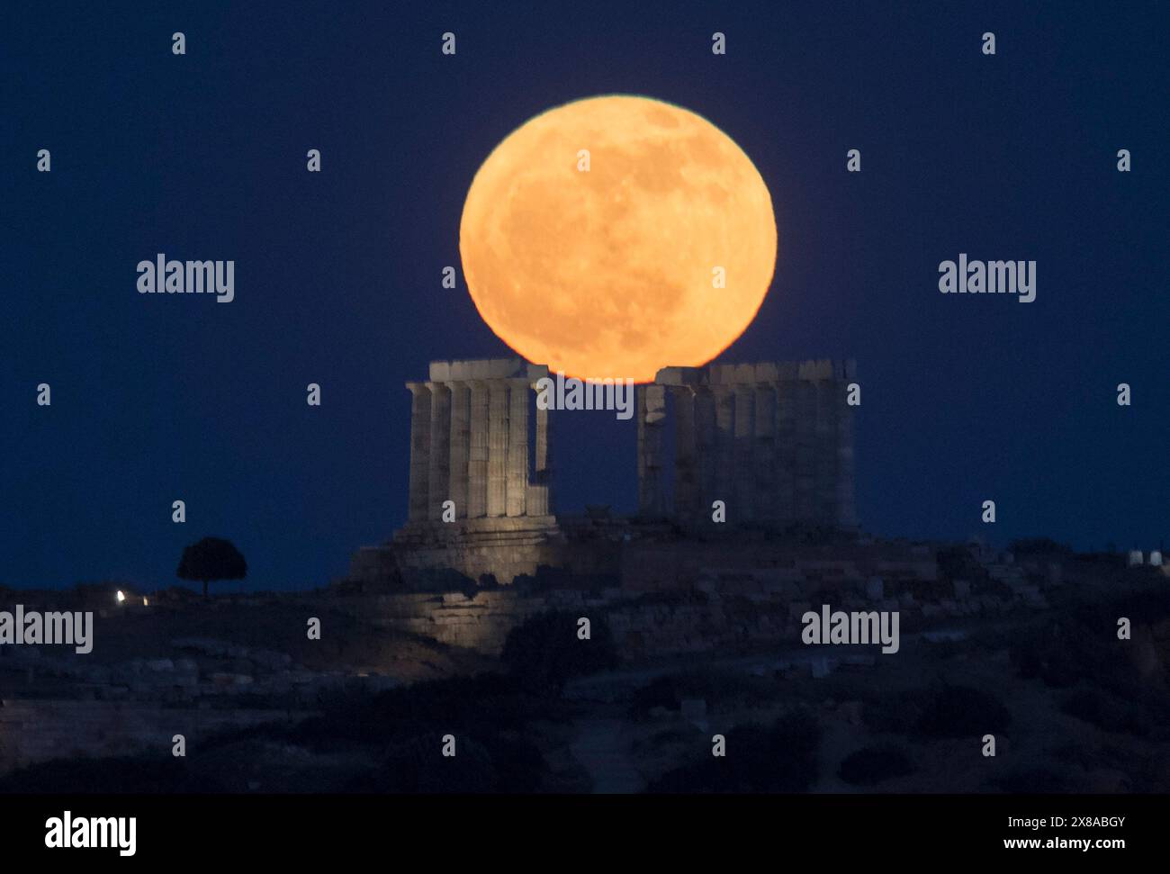 Cape Sounion, Greece. 23rd May, 2024. A full moon rises above the