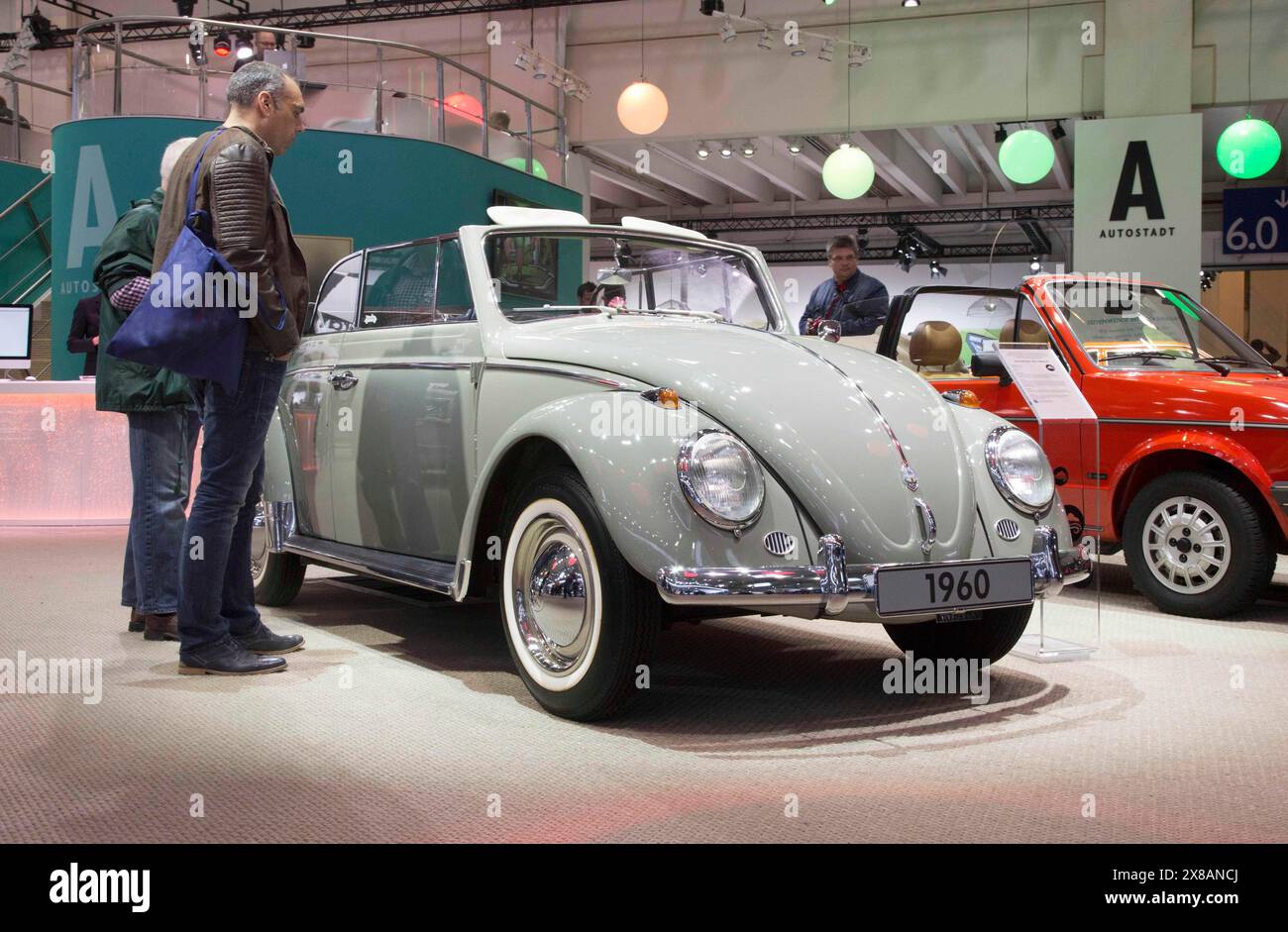 A Volkswagen Beetle convertible, built in 1960, is on display at Techno Classica, the trade fair for vintage, classic and prestige cars, motorsport, m Stock Photo