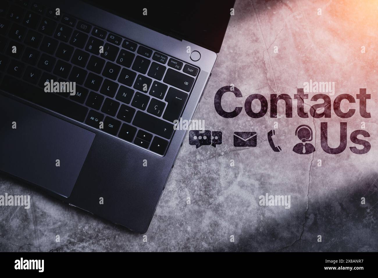 Top view desktop with Contact Us concept. Customer support hotline people connect. Stock Photo